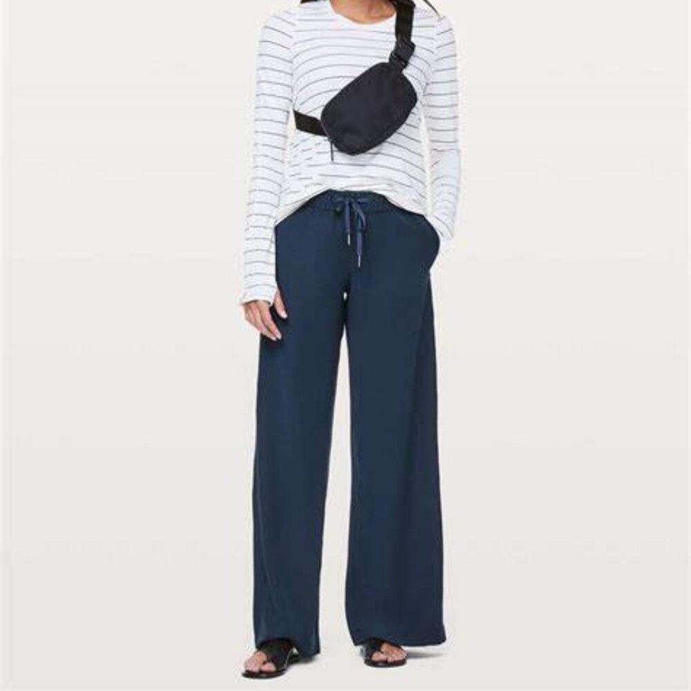 - Lululemon On the Fly Wide Leg True Navy Pants